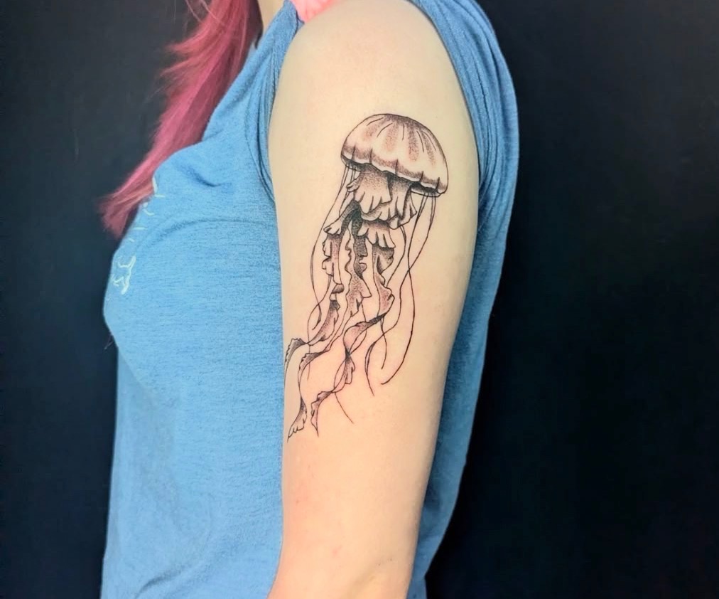 Fine line jellyfish tattoo